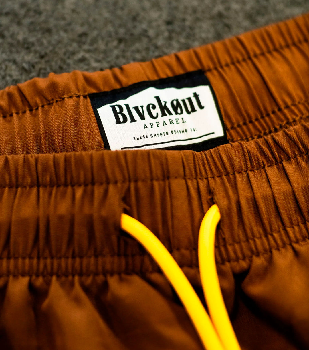 BLVCKOUT CLUB SHORTS BROWN