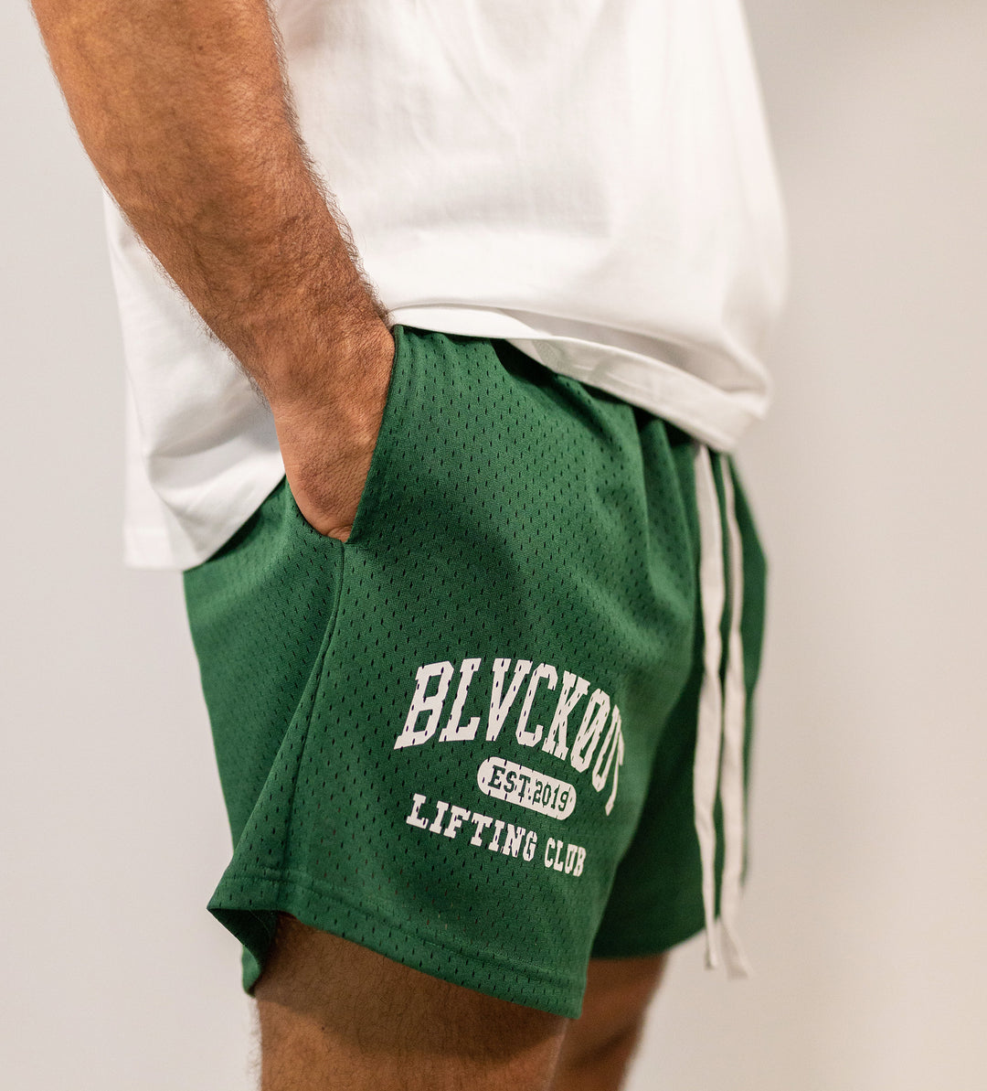 BLVCKOUT COLLEGE SHORTS GREEN